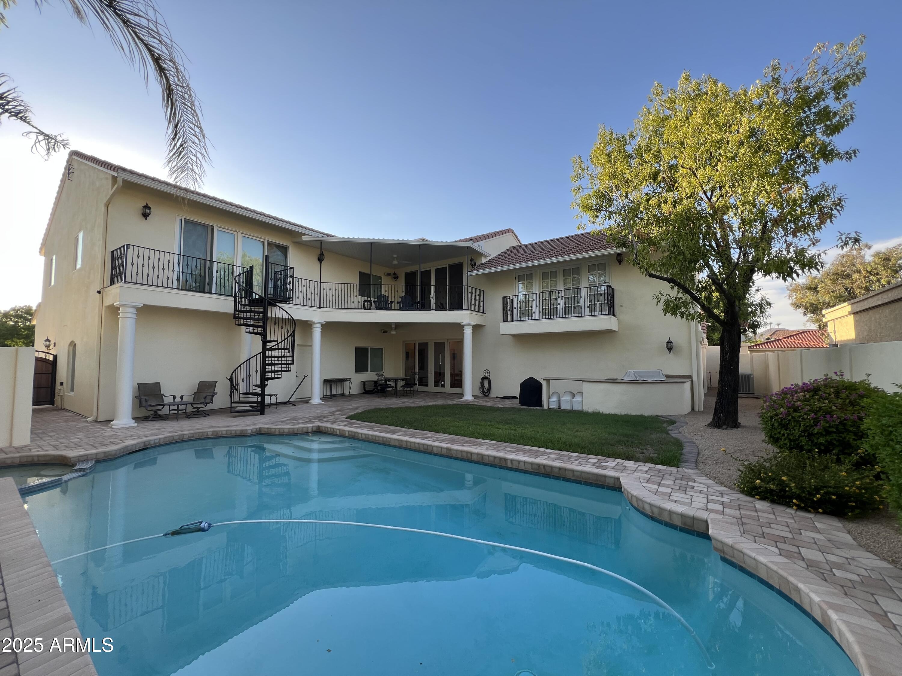 229 West Vista Avenue Phoenix, AZ 85021 - Photo 97 of 113 a view of a house with a swimming pool and sitting area