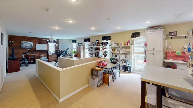 a bathroom with a sink a vanity and a bathtub