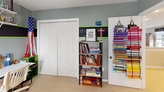 a bedroom with furniture and windows