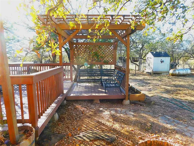 a view of a garage with a lot of stuff