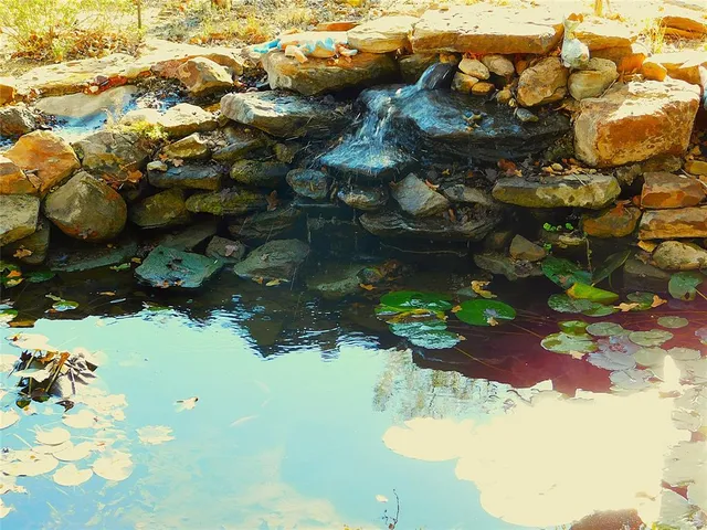 a living room with furniture fireplace and a flat screen tv