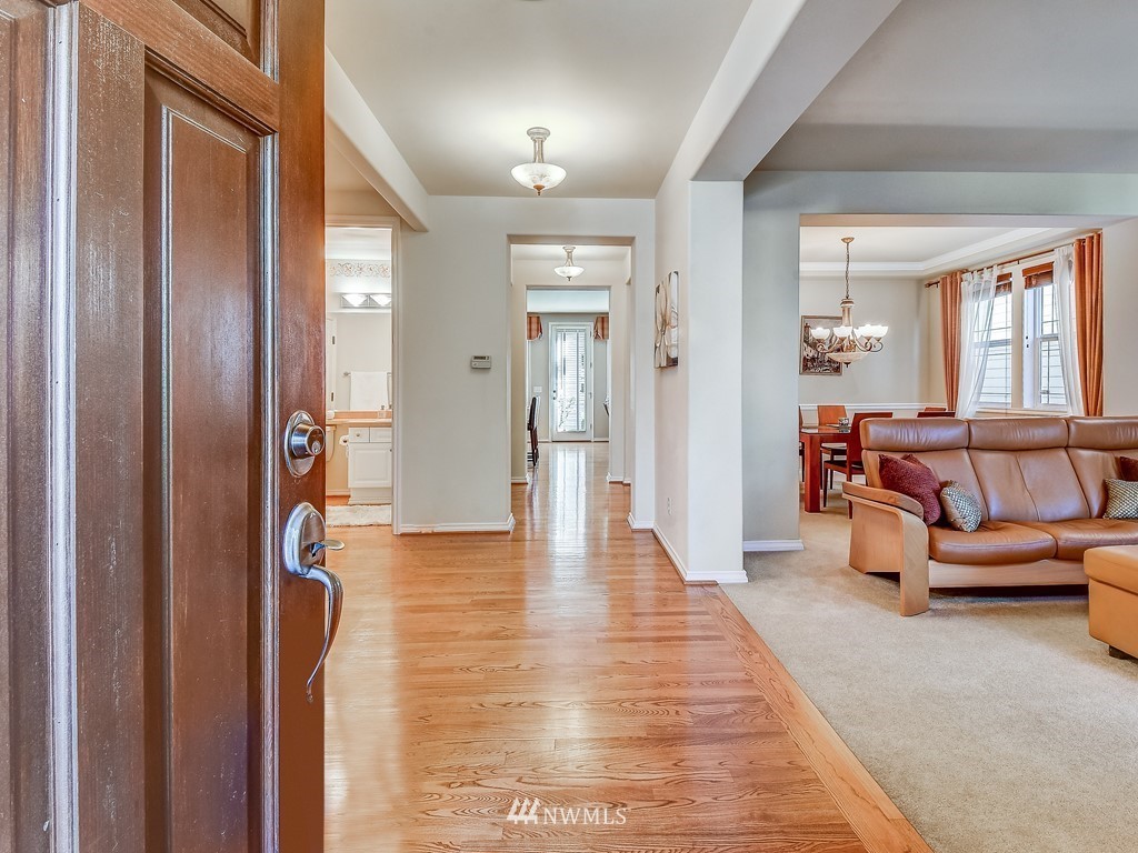 17070 Parkside Way Southeast Renton, WA 98058 - Photo 2 of 25 a view of a livingroom with furniture and windows