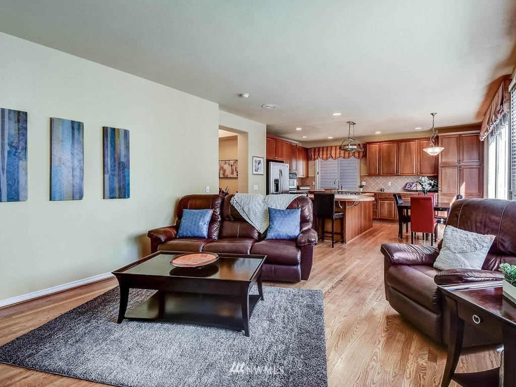 17070 Parkside Way Southeast Renton, WA 98058 - Photo 14 of 25 a living room with furniture and kitchen view