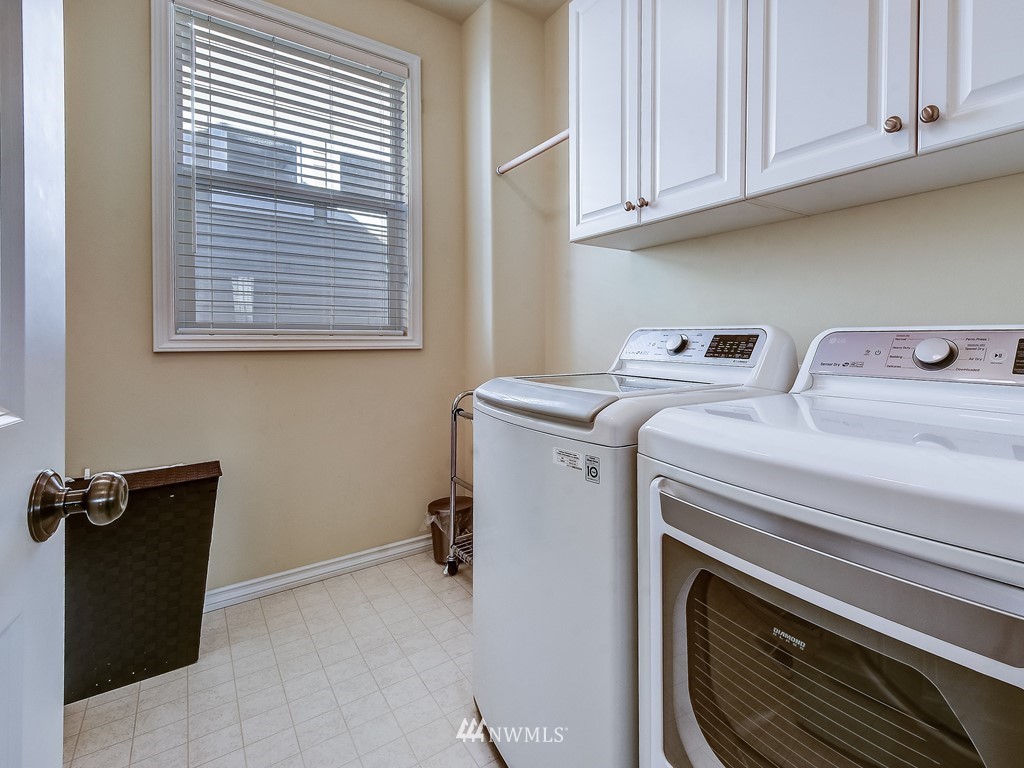 17070 Parkside Way Southeast Renton, WA 98058 - Photo 23 of 25 a utility room with dryer and washer