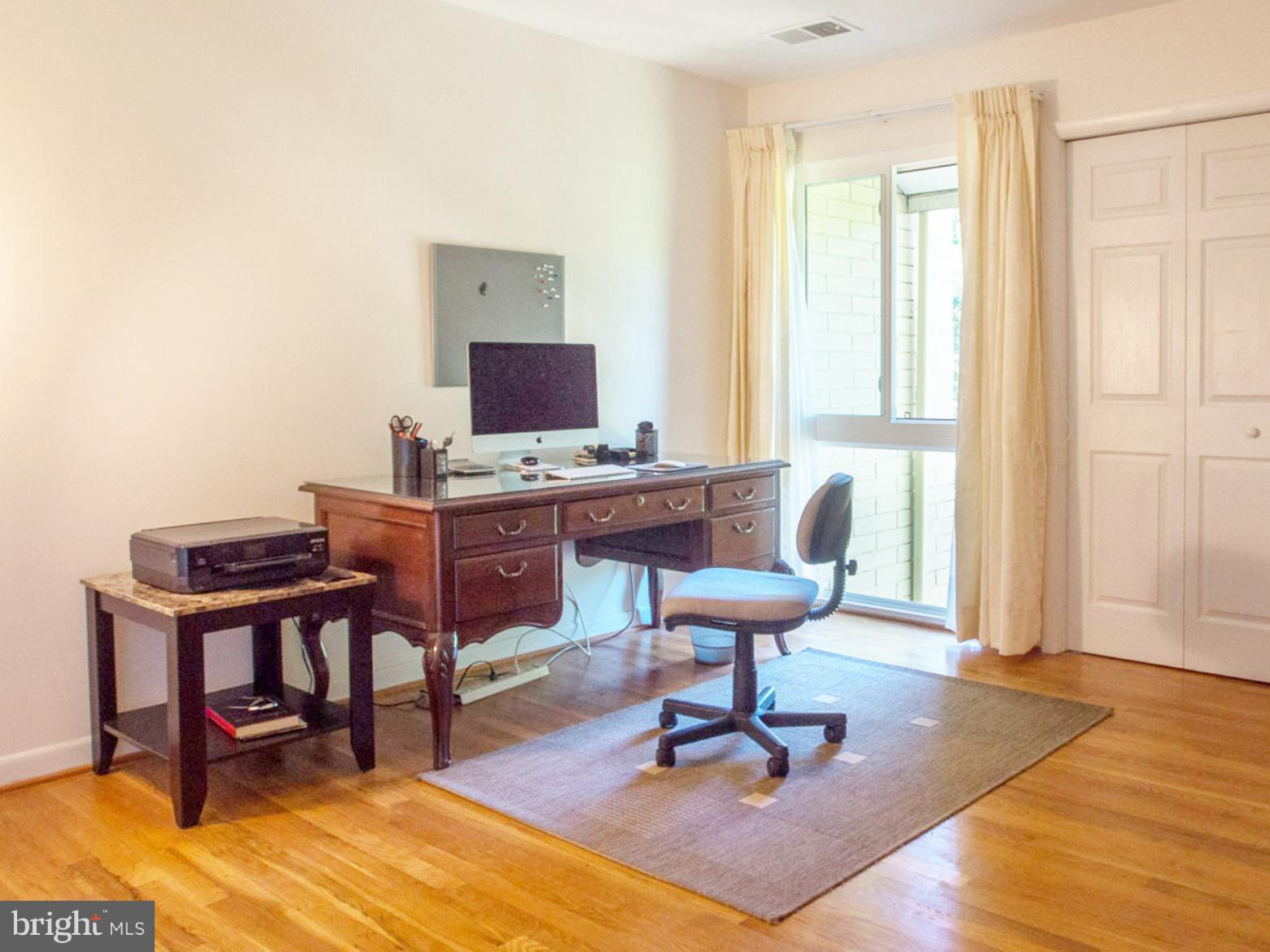 11168 Saffold Way Reston, VA 20190 - Photo 16 of 28 a workspace with furniture and a window