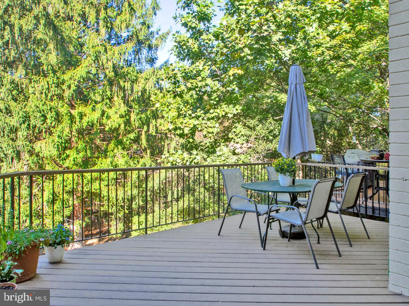 11168 Saffold Way Reston, VA 20190 - Photo 26 of 28 a view of a lake with table and chairs