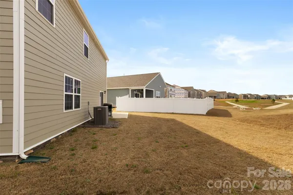 a house view with a backyard space