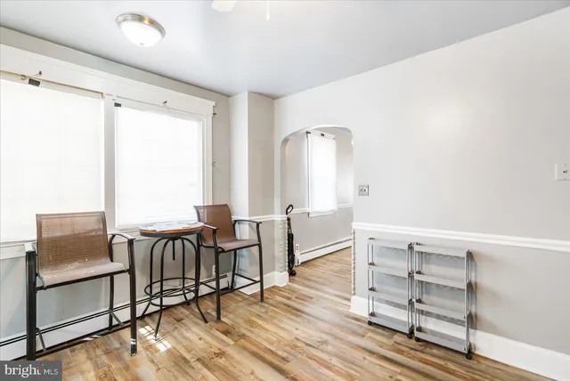 a view of workspace with wooden floor