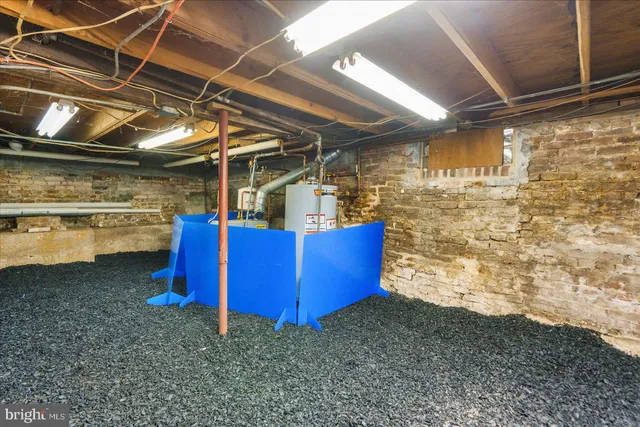 a view of a room with wooden walls