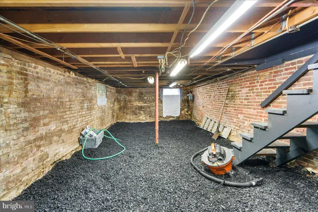 a view of outdoor space with wooden deck and barbeque oven