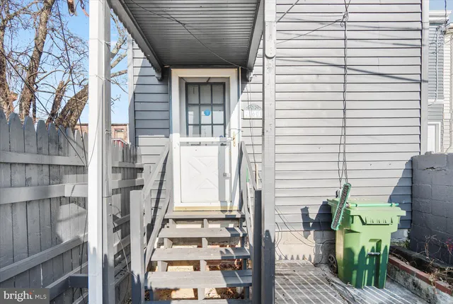 a view of balcony with furniture