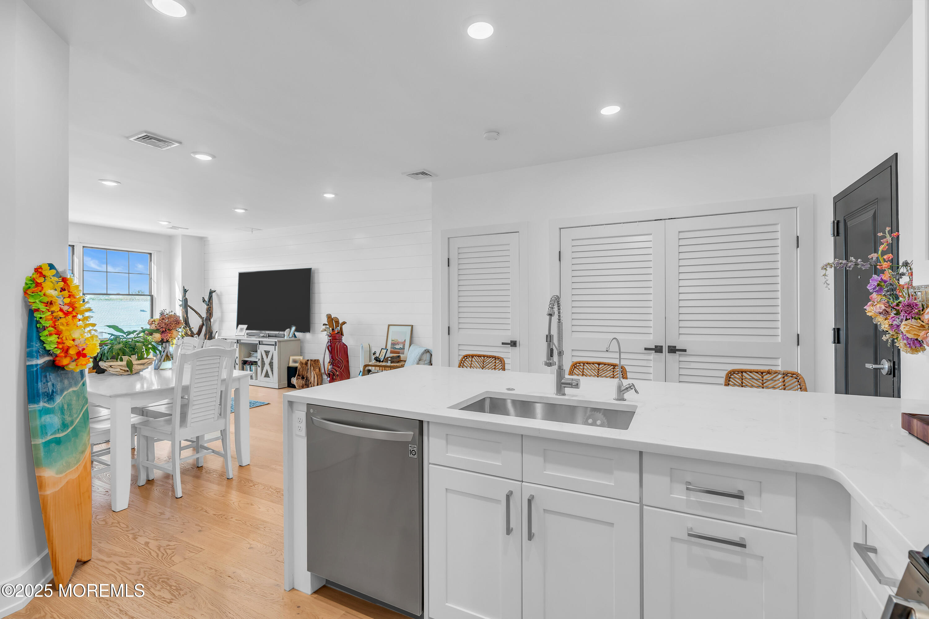 1801 Highway 35, Unit 11 Belmar, NJ 07719 - Photo 21 of 37 a kitchen that has a sink and a table in it