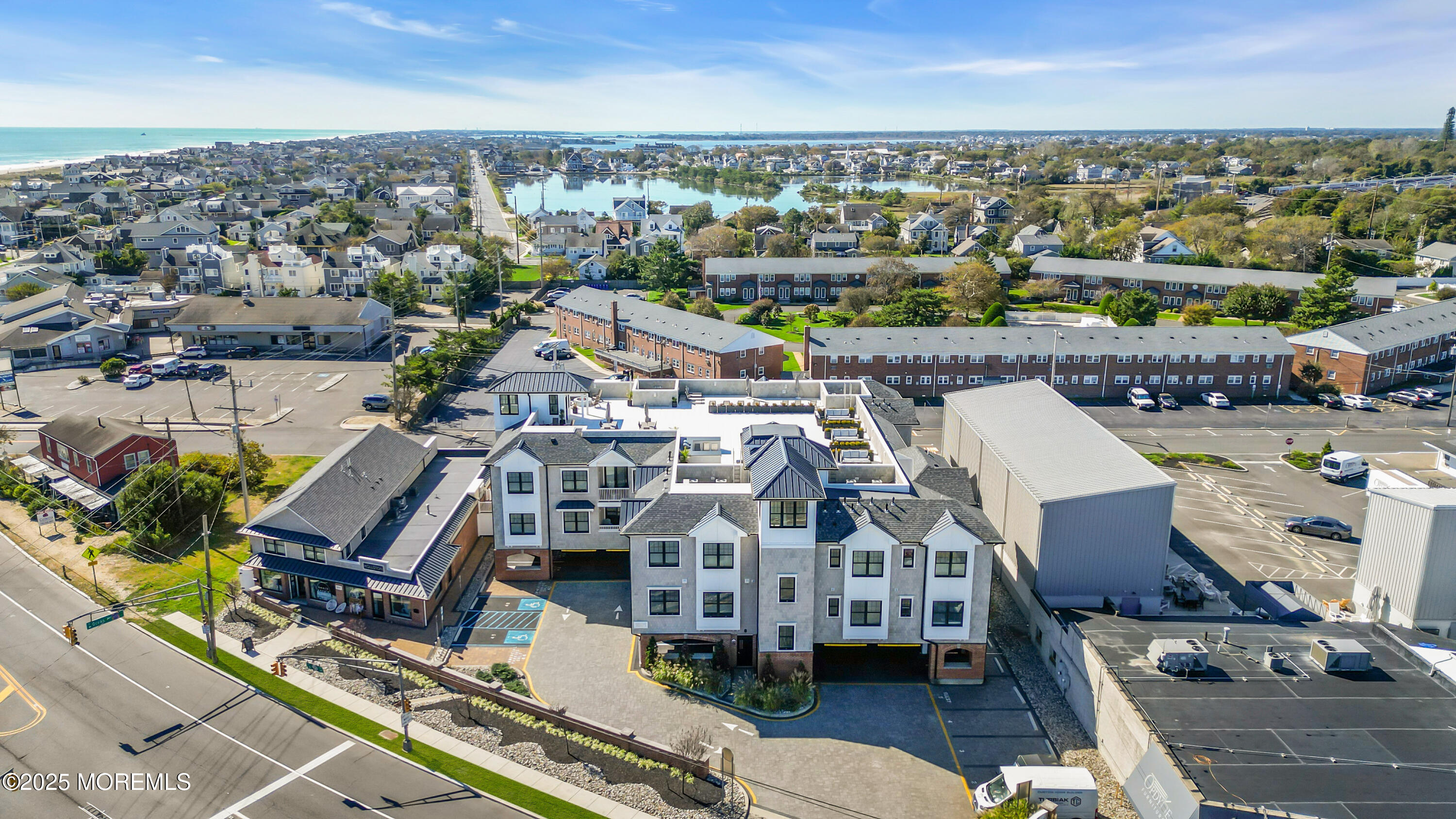 1801 Highway 35, Unit 11 Belmar, NJ 07719 - Photo 6 of 37 an aerial view of a city with lots of residential buildings
