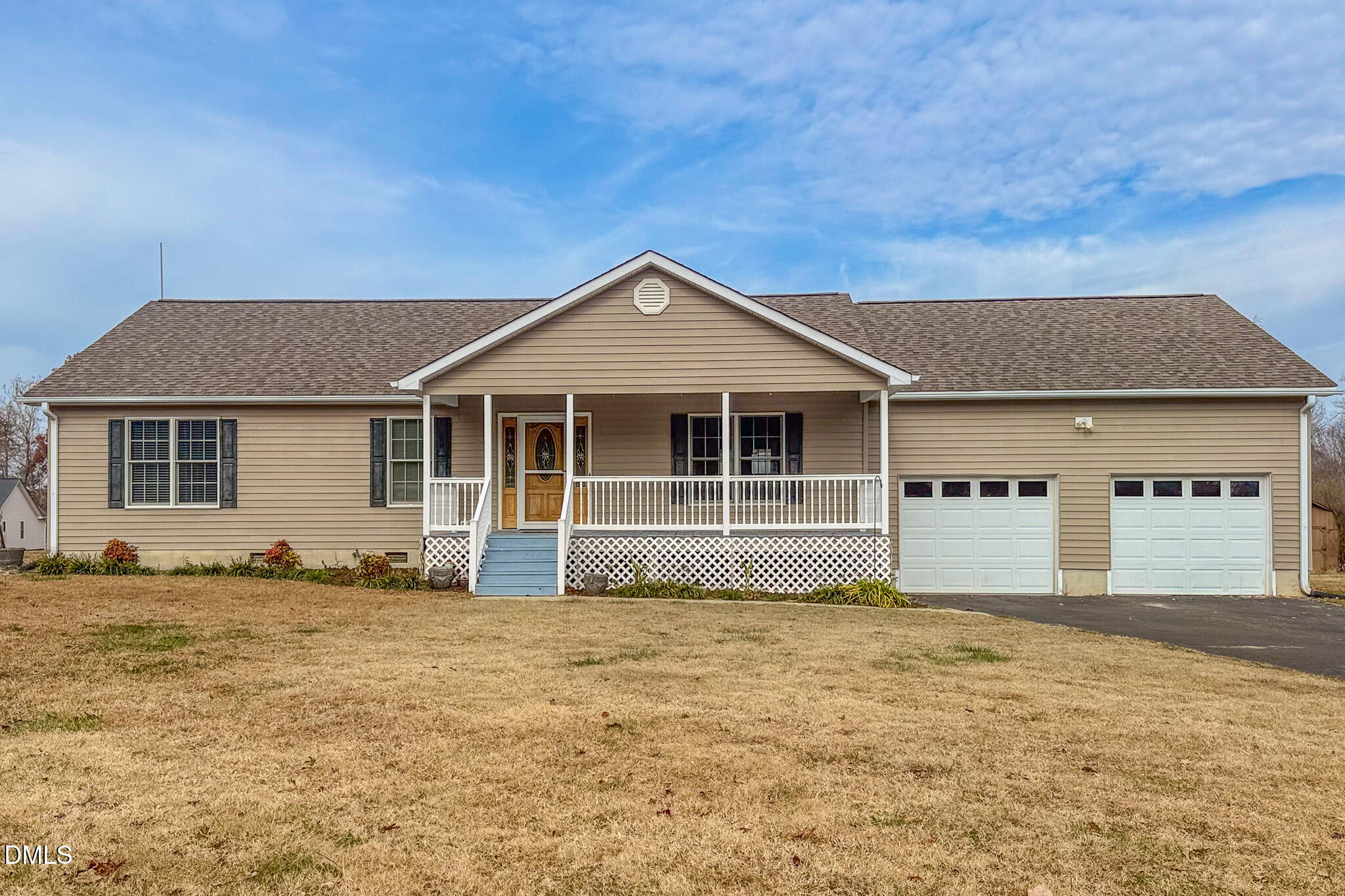 111 Fox Crossing Drive Roxboro, NC 27574 - Photo 25 of 25 a front view of a house with a garden