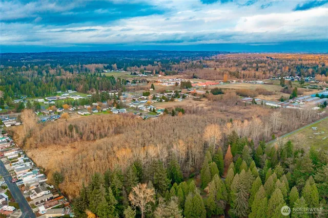 a view of swimming pool with a yard and outdoor seating