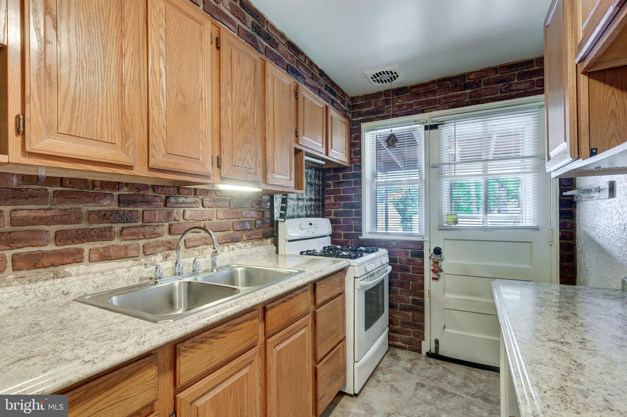 729 Aldworth Road Dundalk, MD 21222 - Photo 12 of 39 Kitchen with entrance to back porch