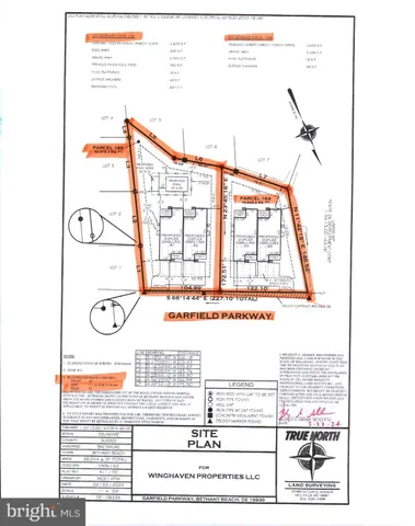 a picture of a bench in front of a house