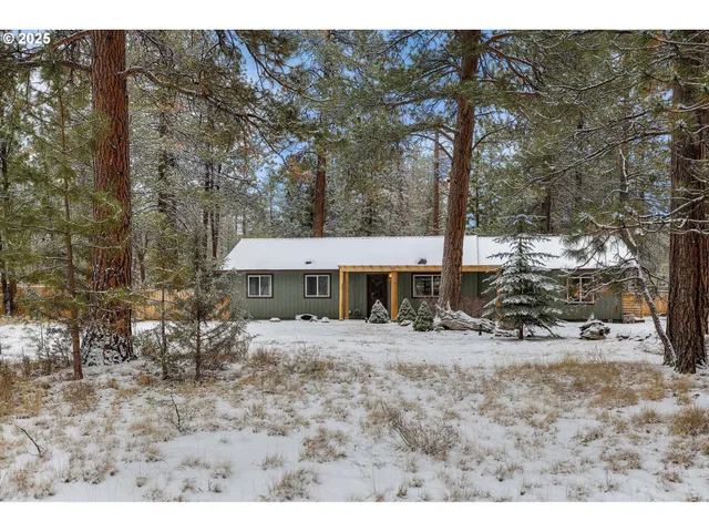 a view of a patio with a yard