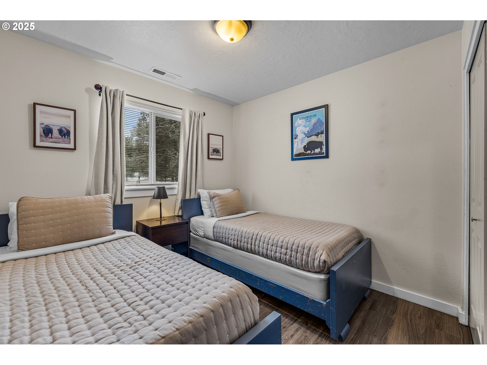 69322 Hackamore Sisters, OR 97759 - Photo 23 of 40 a bedroom with double bed and a window