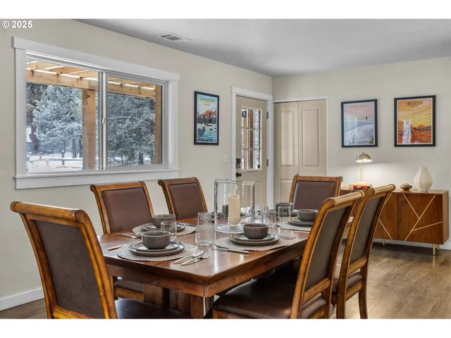 a view of a dining room with furniture window and outside view