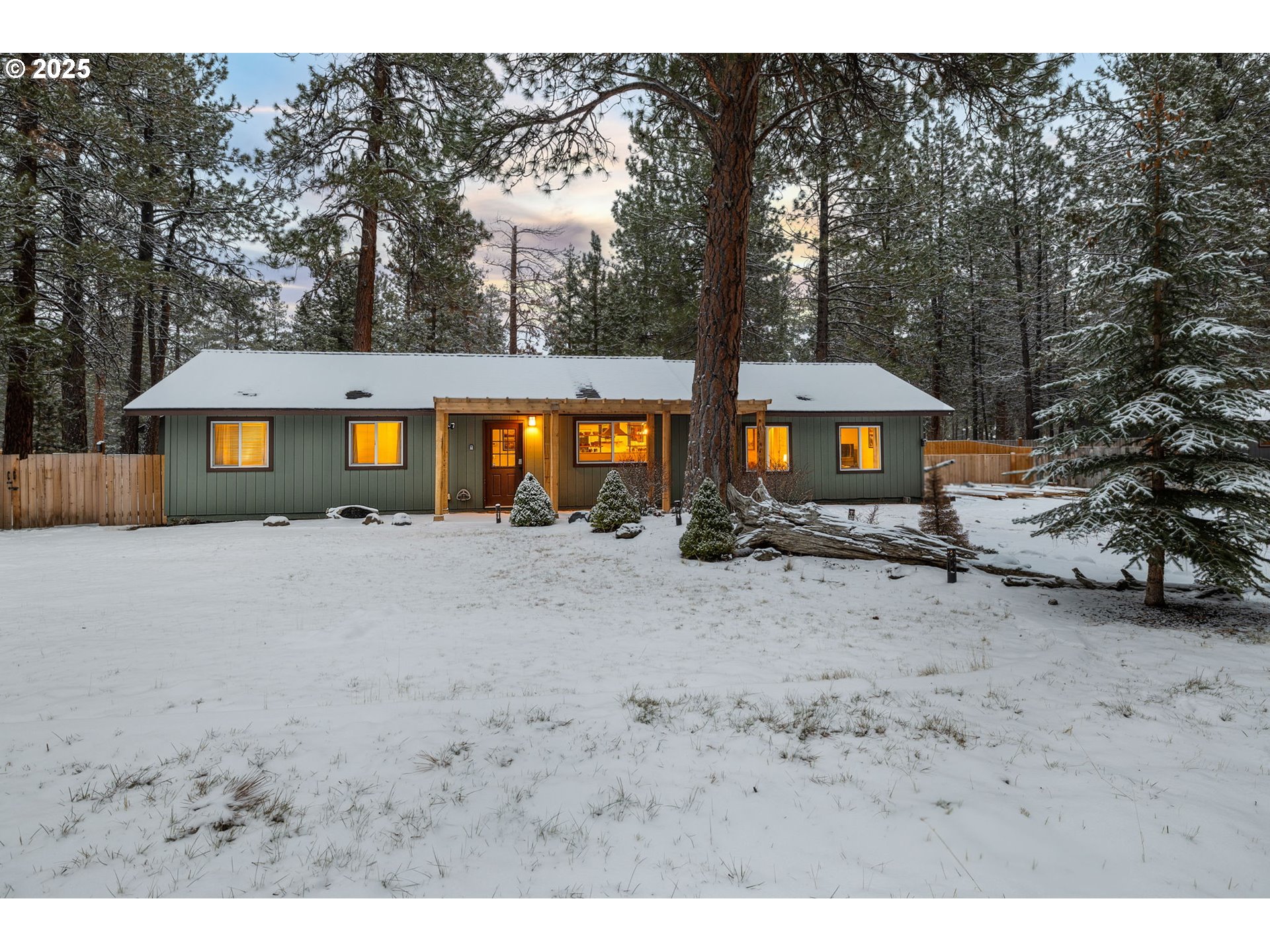 69322 Hackamore Sisters, OR 97759 - Photo 37 of 40 a front view of a house with a yard and tree s