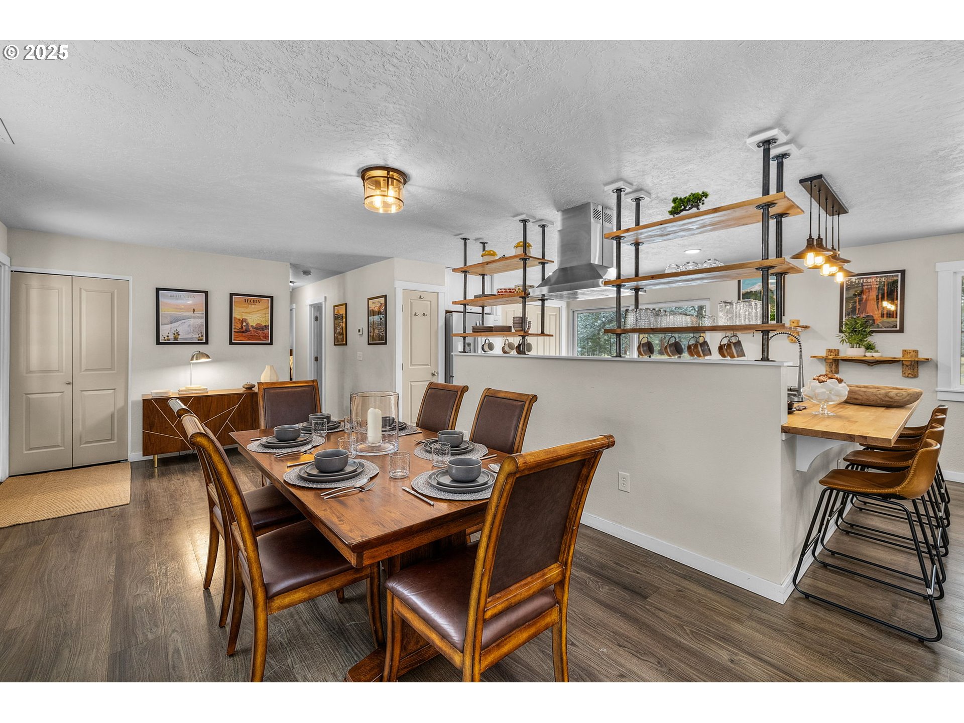 69322 Hackamore Sisters, OR 97759 - Photo 7 of 40 a view of a dining room with furniture and wooden floor