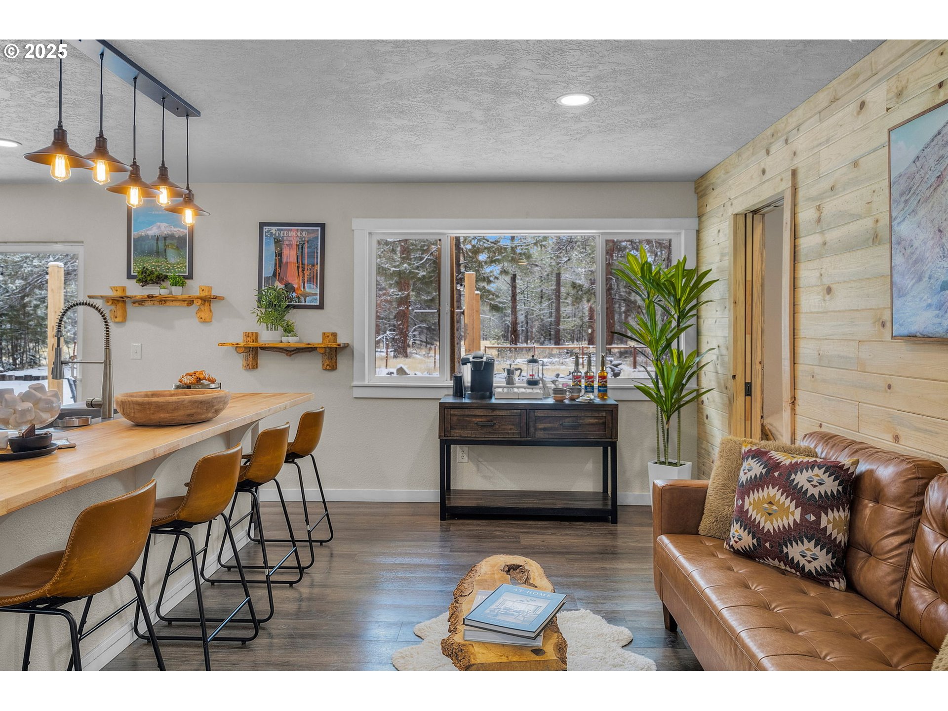 69322 Hackamore Sisters, OR 97759 - Photo 8 of 40 a living room with furniture a chandelier and a dining table