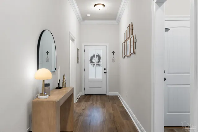 a view of a bedroom from a hallway