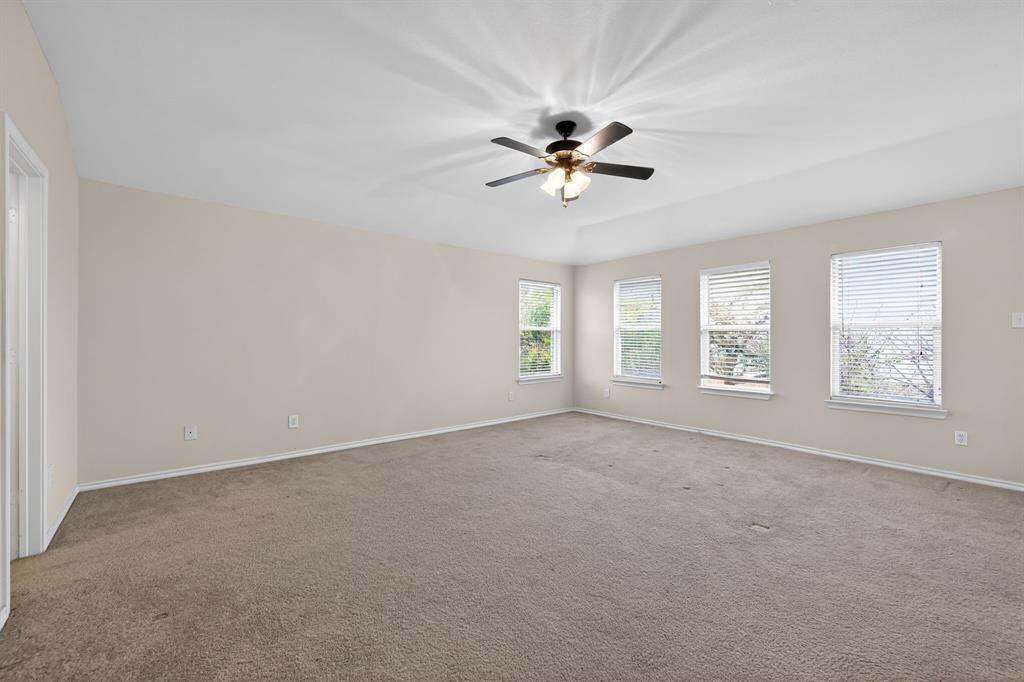 8618 Scooner Street Rowlett, TX 75089 - Photo 11 of 30 a view of empty room with windows