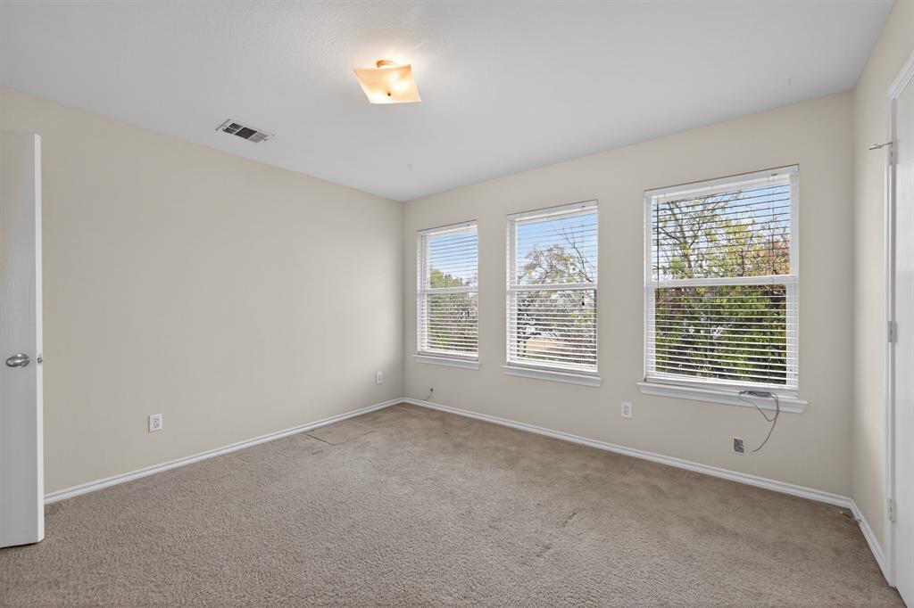 8618 Scooner Street Rowlett, TX 75089 - Photo 10 of 30 a view of an empty room with a window