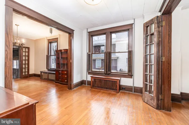 a kitchen with stainless steel appliances kitchen island granite countertop a stove a sink and a microwave