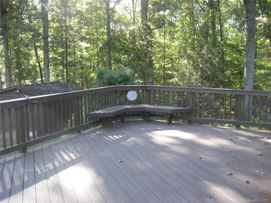 755 Shady Forest Road, Unit 2 Clover, SC 29710 - Photo 14 of 24 a view of a deck with two chairs and wooden fence