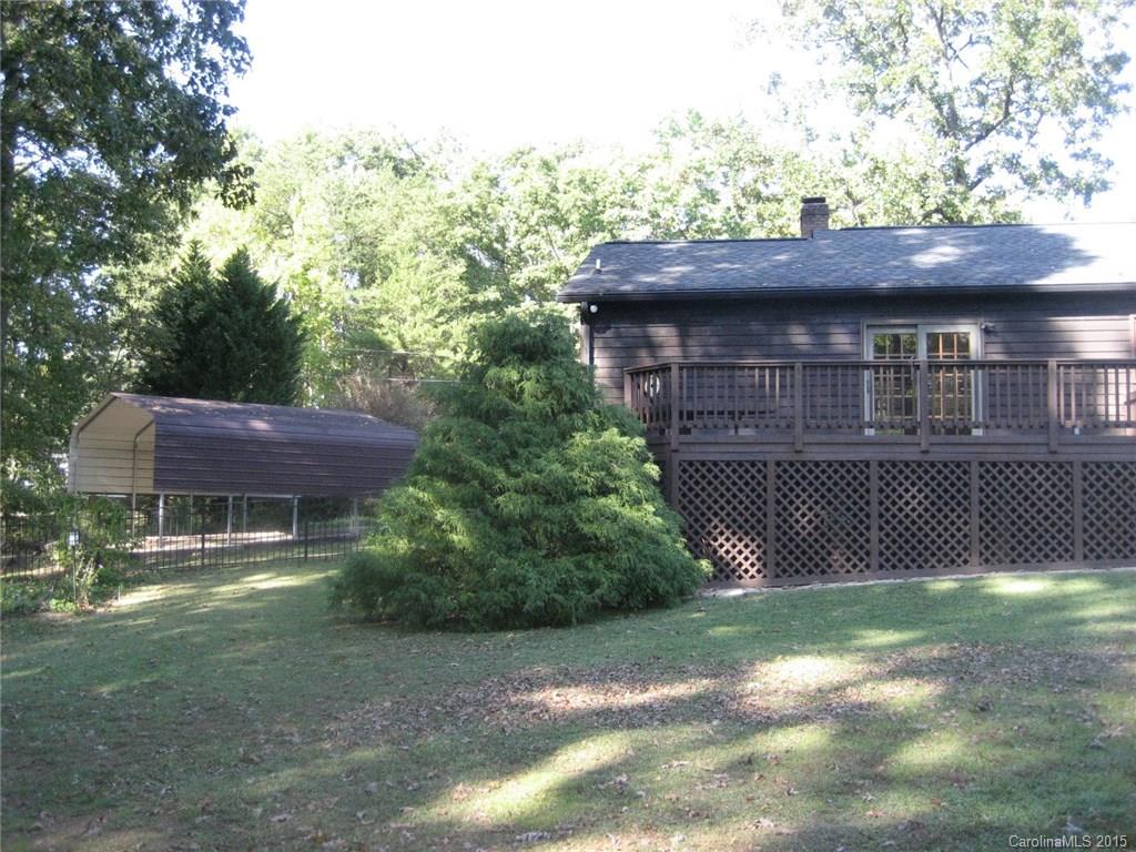 755 Shady Forest Road, Unit 2 Clover, SC 29710 - Photo 17 of 24 a front view of a house with a garden