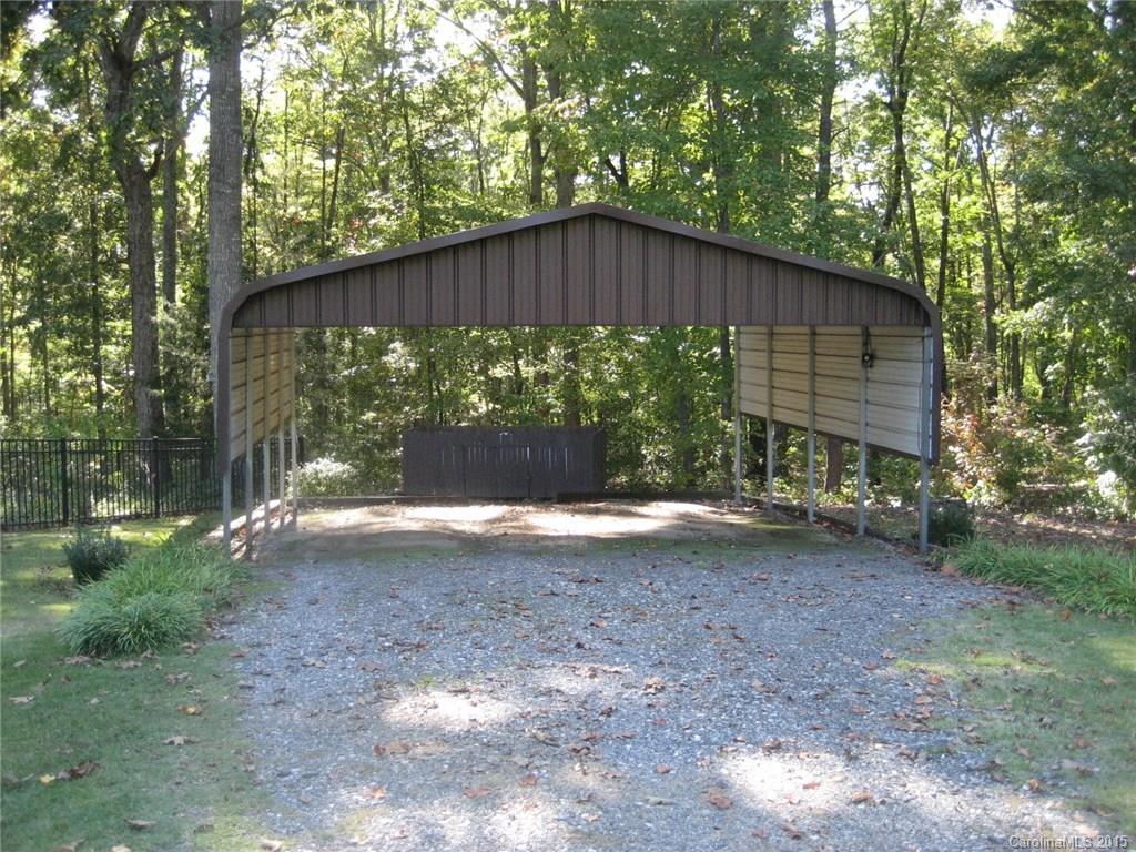 755 Shady Forest Road, Unit 2 Clover, SC 29710 - Photo 21 of 24 a backyard of a house with a yard and outdoor seating