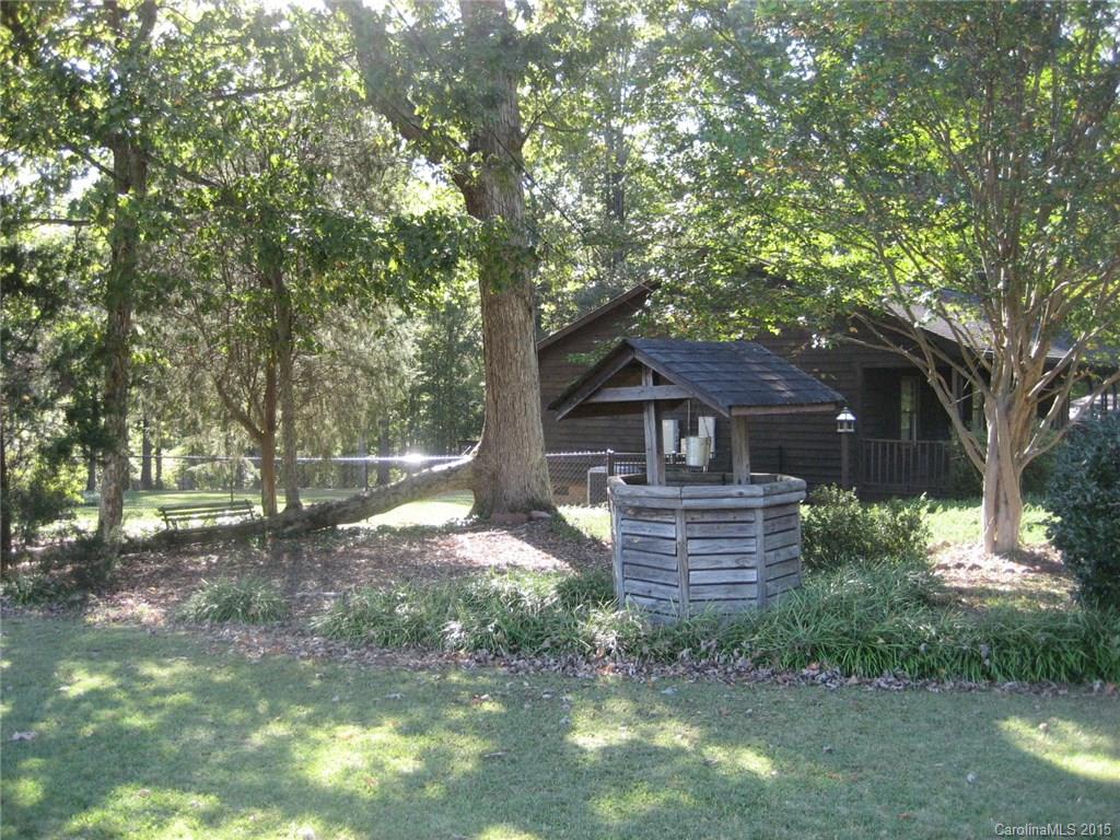 755 Shady Forest Road, Unit 2 Clover, SC 29710 - Photo 22 of 24 a front view of a house with a yard