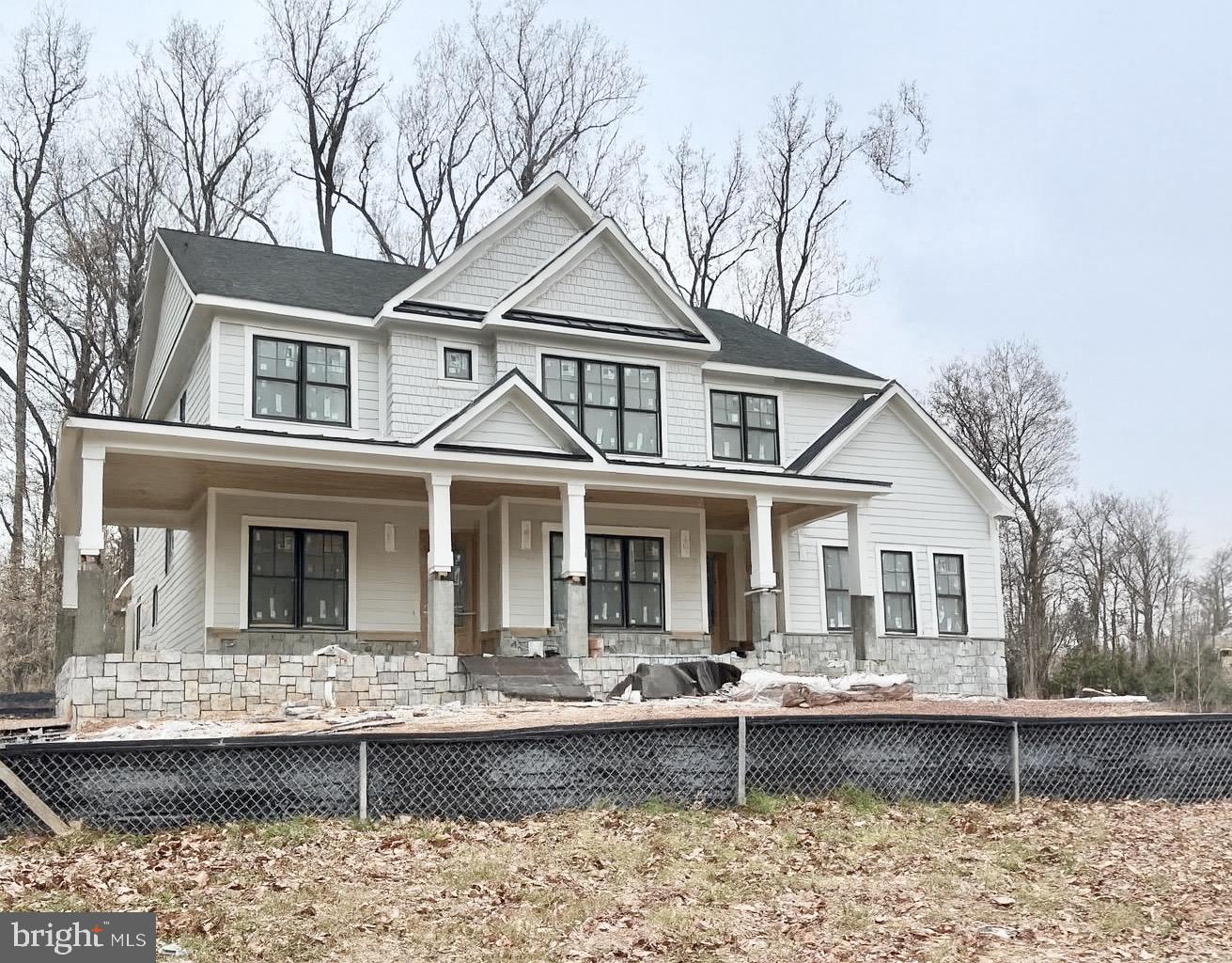 a front view of a house with swimming pool
