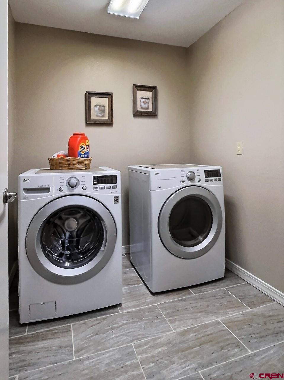 24835 Cactus Park Road Cedaredge, CO 81413 - Photo 12 of 35 a utility room with dryer and washer
