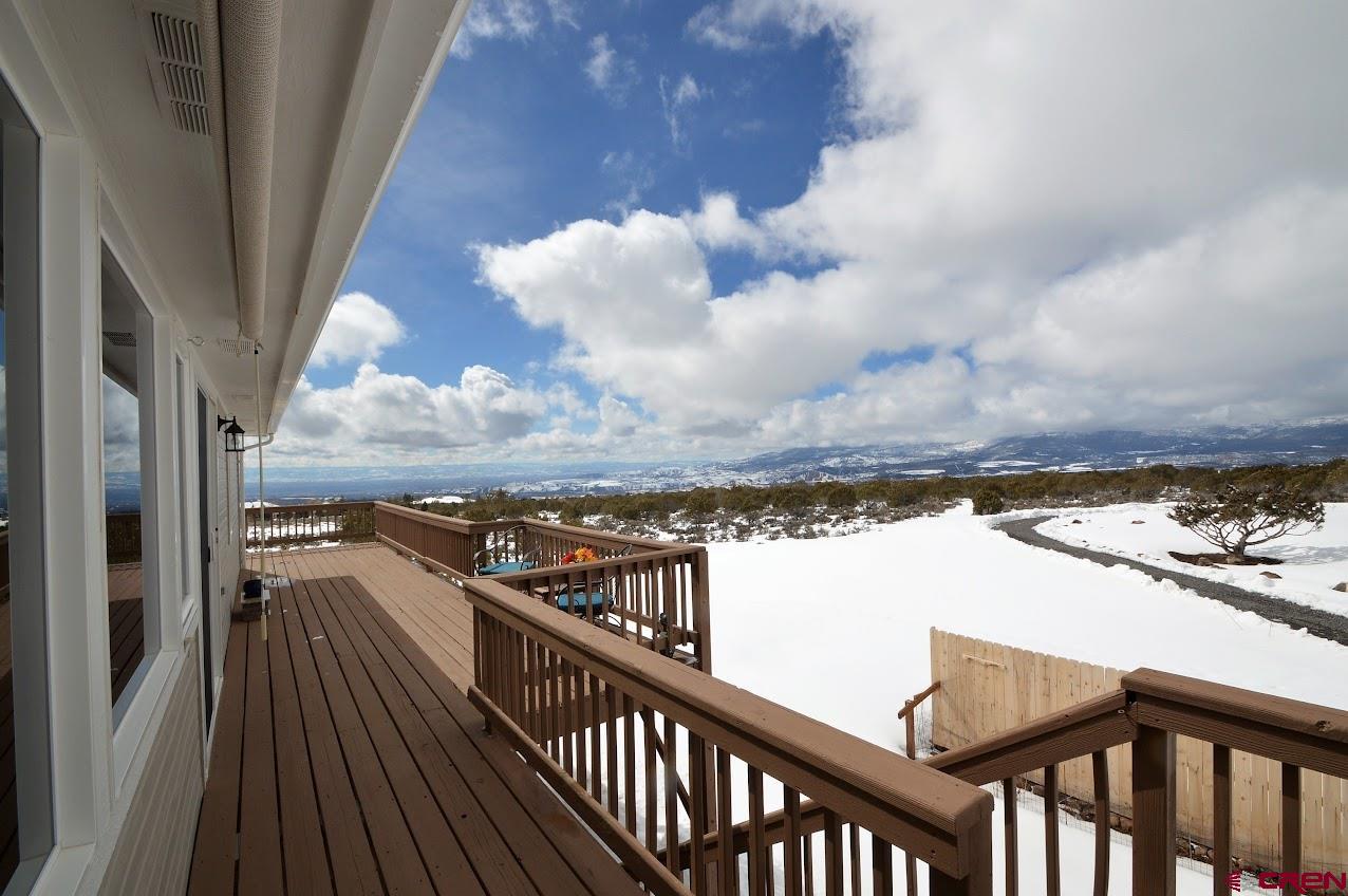 24835 Cactus Park Road Cedaredge, CO 81413 - Photo 29 of 35 a view of a balcony with an ocean view