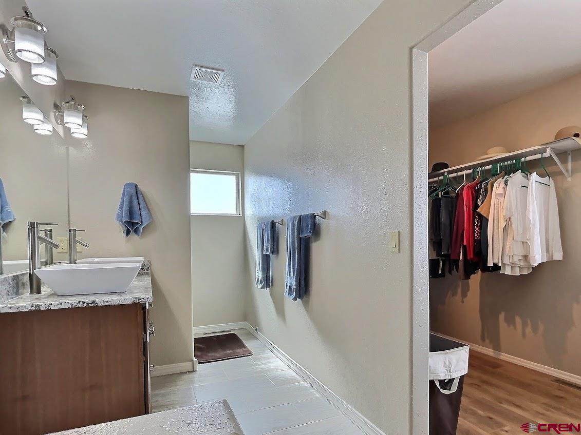 24835 Cactus Park Road Cedaredge, CO 81413 - Photo 10 of 35 a view of a walk in closet