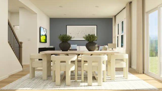 a living room with large windows and a chandelier