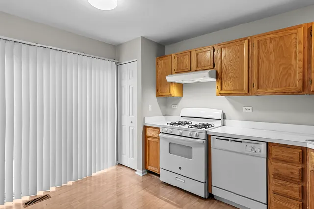 a kitchen with a stove top oven