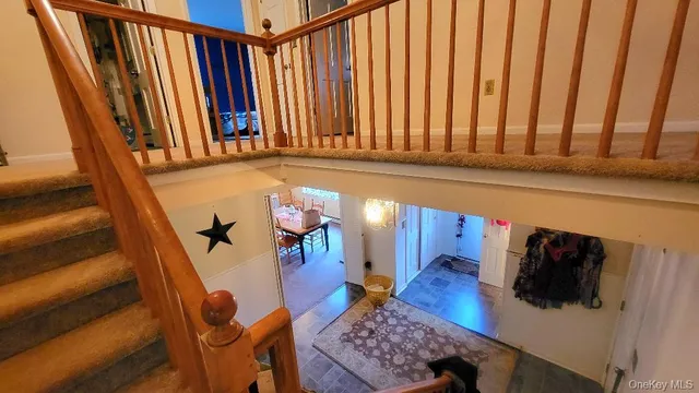 a view of stairs and furniture