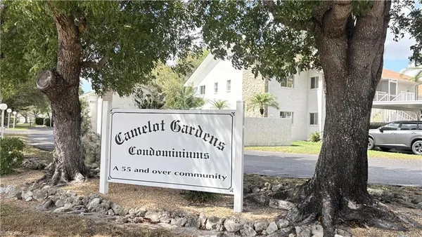 a sign on the side of the road