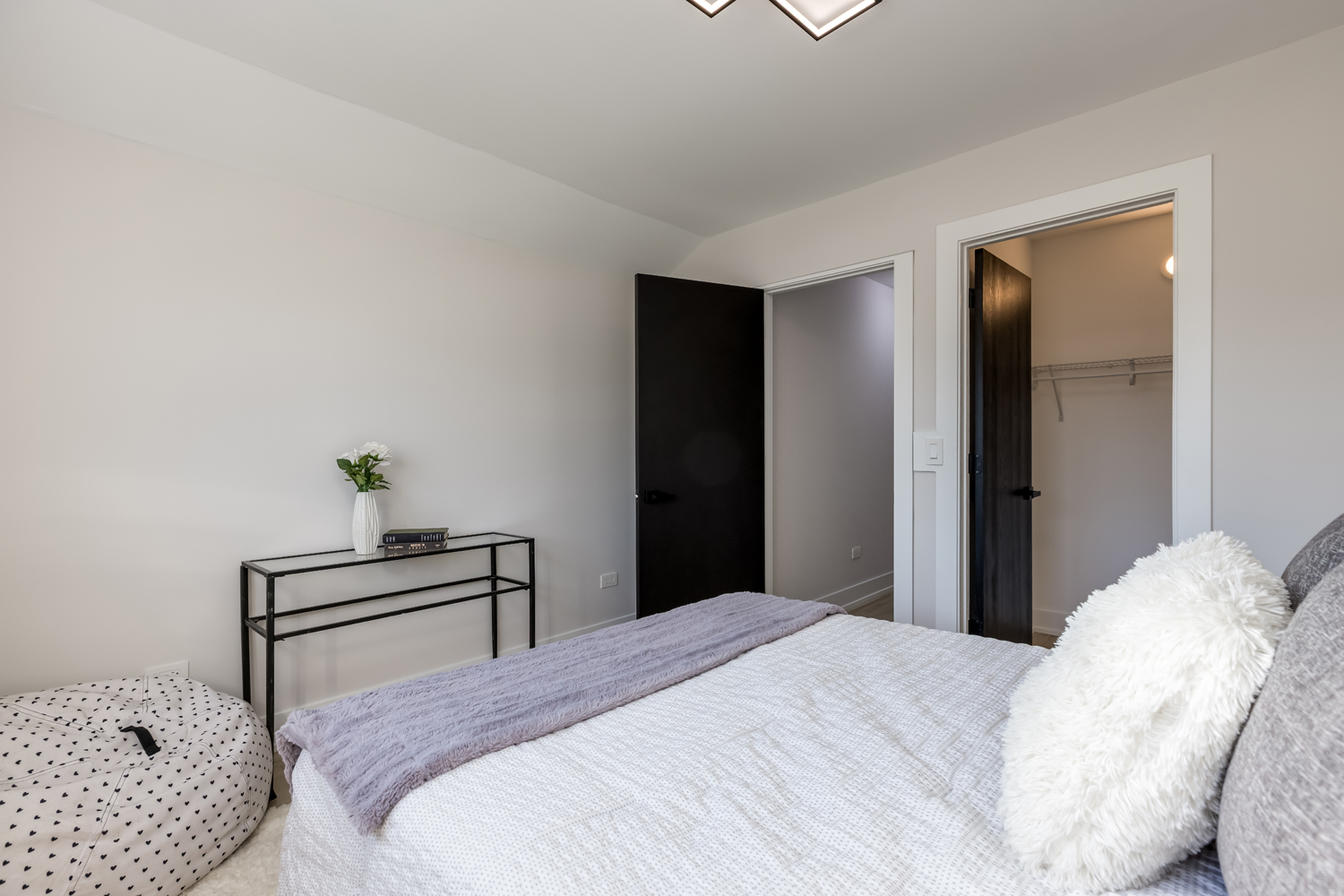7114 Olde Gatehouse Road Tinley Park, IL 60477 - Photo 16 of 21 a bedroom with a bed and a lamp on the dresser