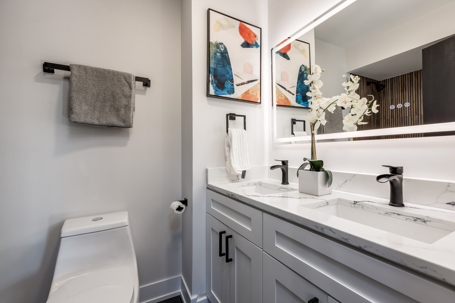 7114 Olde Gatehouse Road Tinley Park, IL 60477 - Photo 18 of 21 a bathroom with a sink a toilet and mirror