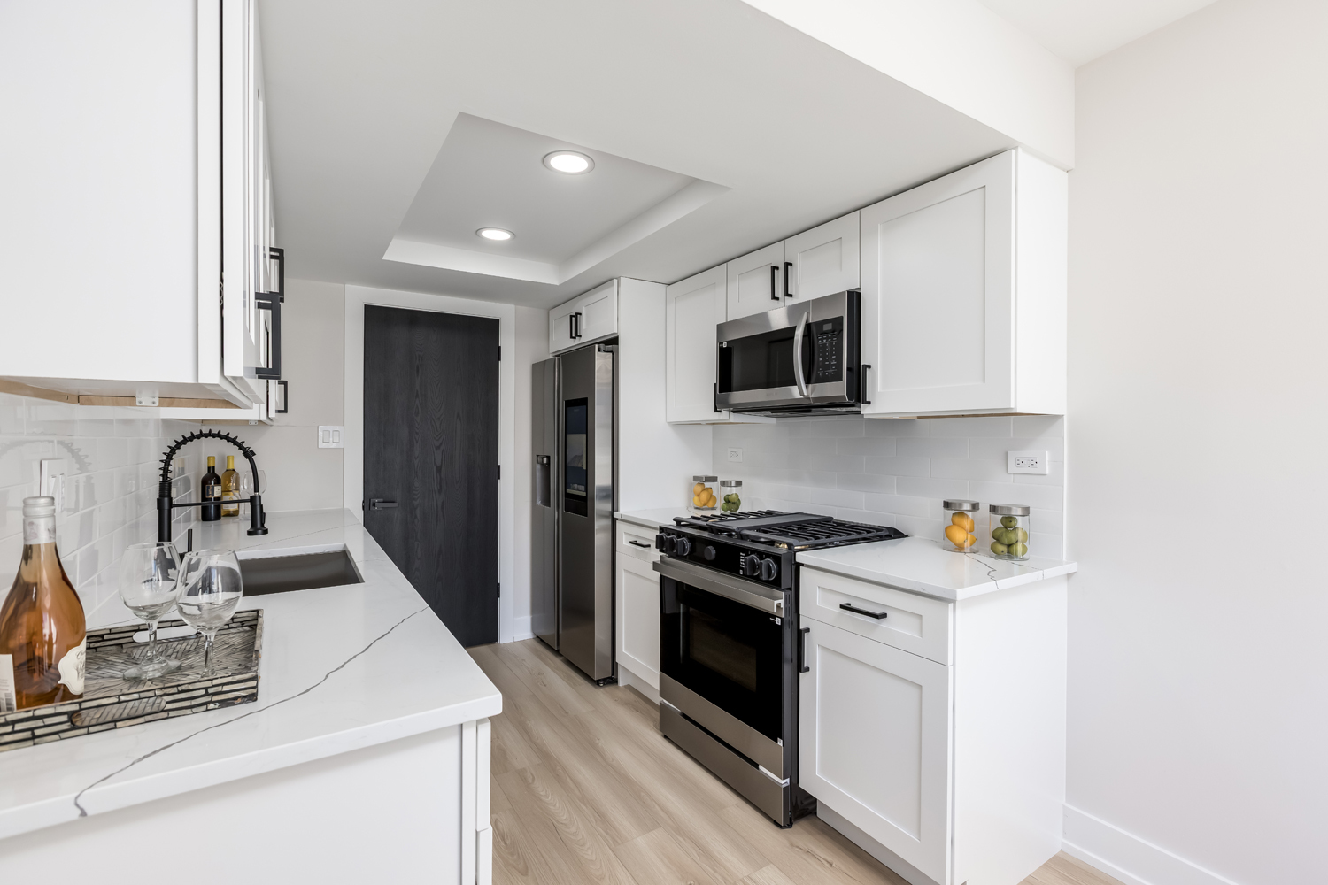 7114 Olde Gatehouse Road Tinley Park, IL 60477 - Photo 3 of 21 a kitchen with a sink stove and refrigerator