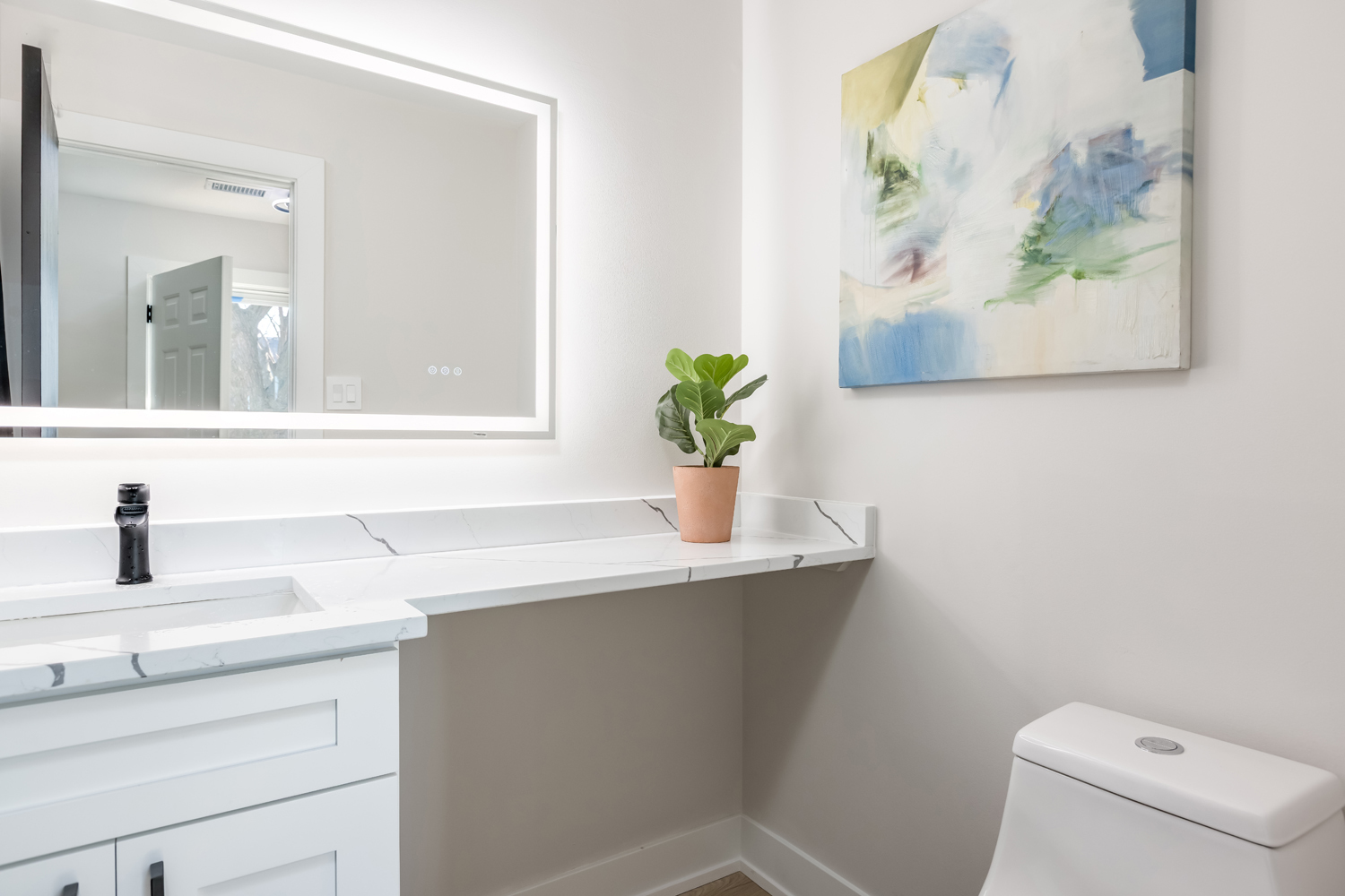 7114 Olde Gatehouse Road Tinley Park, IL 60477 - Photo 5 of 21 a bathroom with a sink a toilet and a mirror