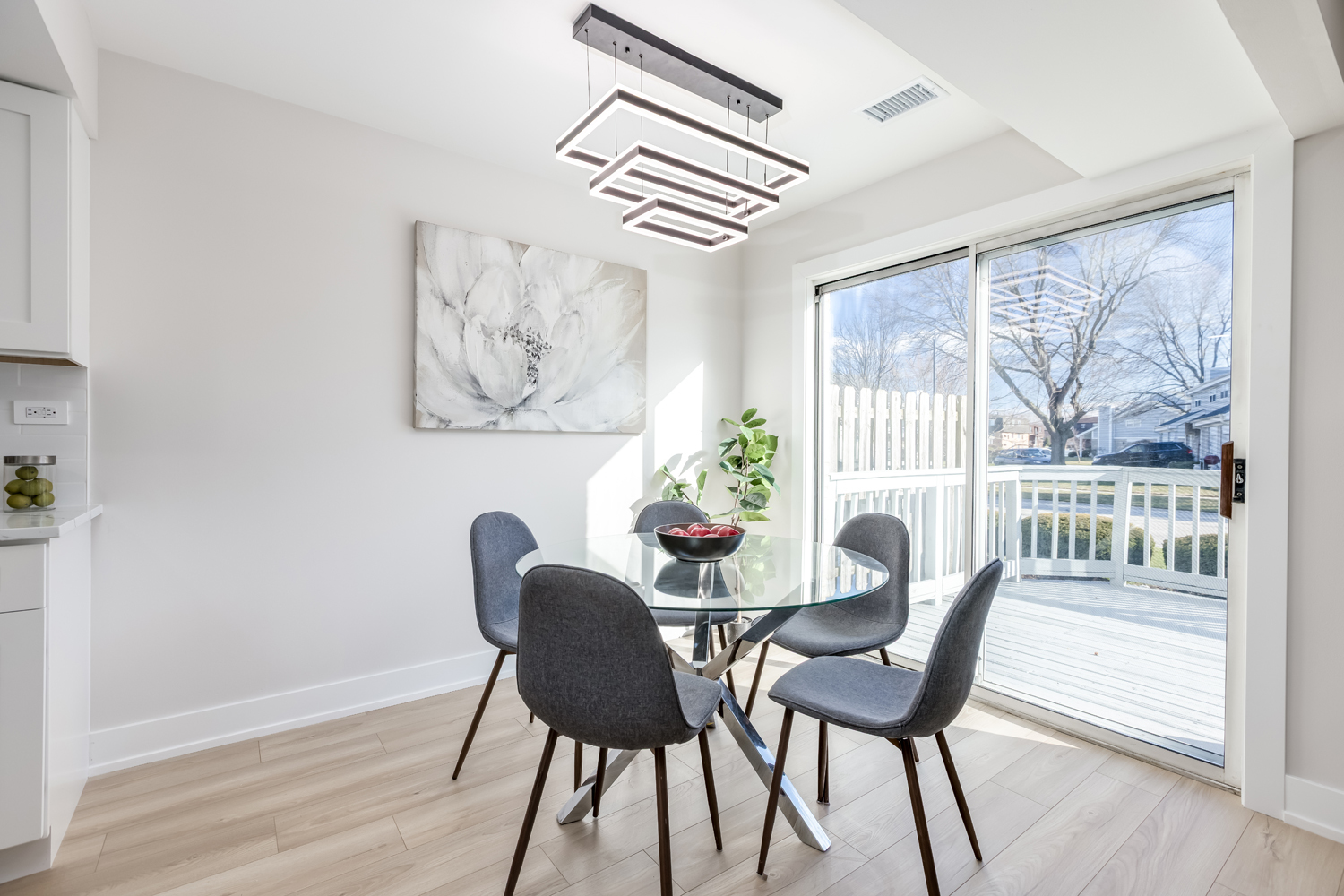 7114 Olde Gatehouse Road Tinley Park, IL 60477 - Photo 10 of 21 a view of a dining room with furniture a chandelier and wooden floor