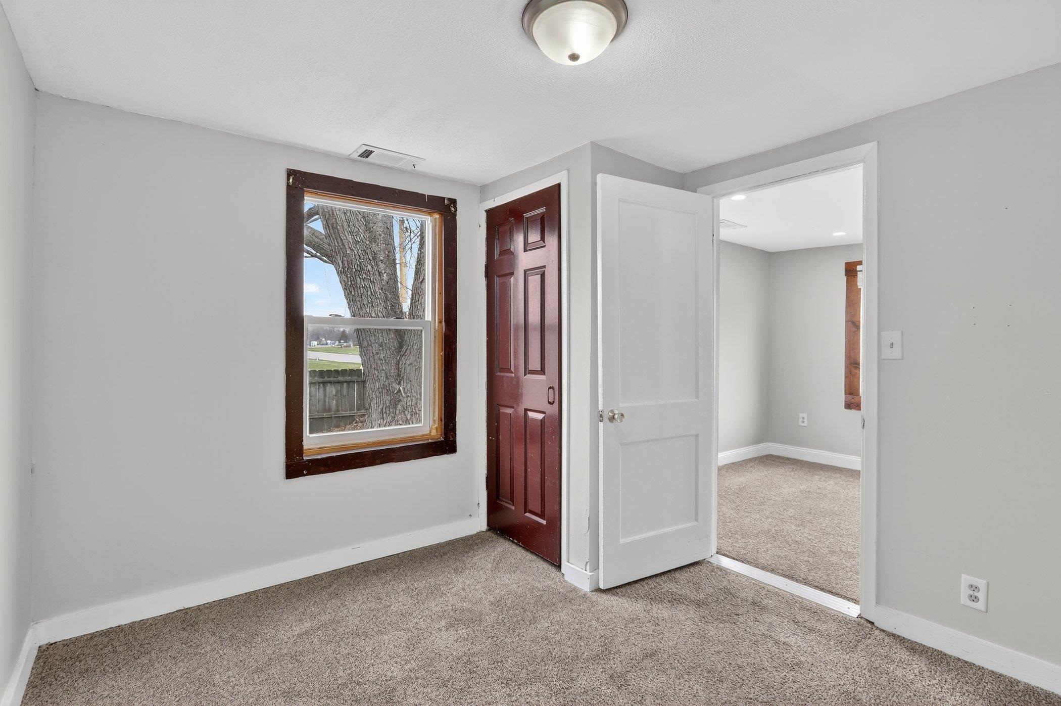 2120 Belden Street Rockford, IL 61101 - Photo 14 of 22 an empty room with windows and closet