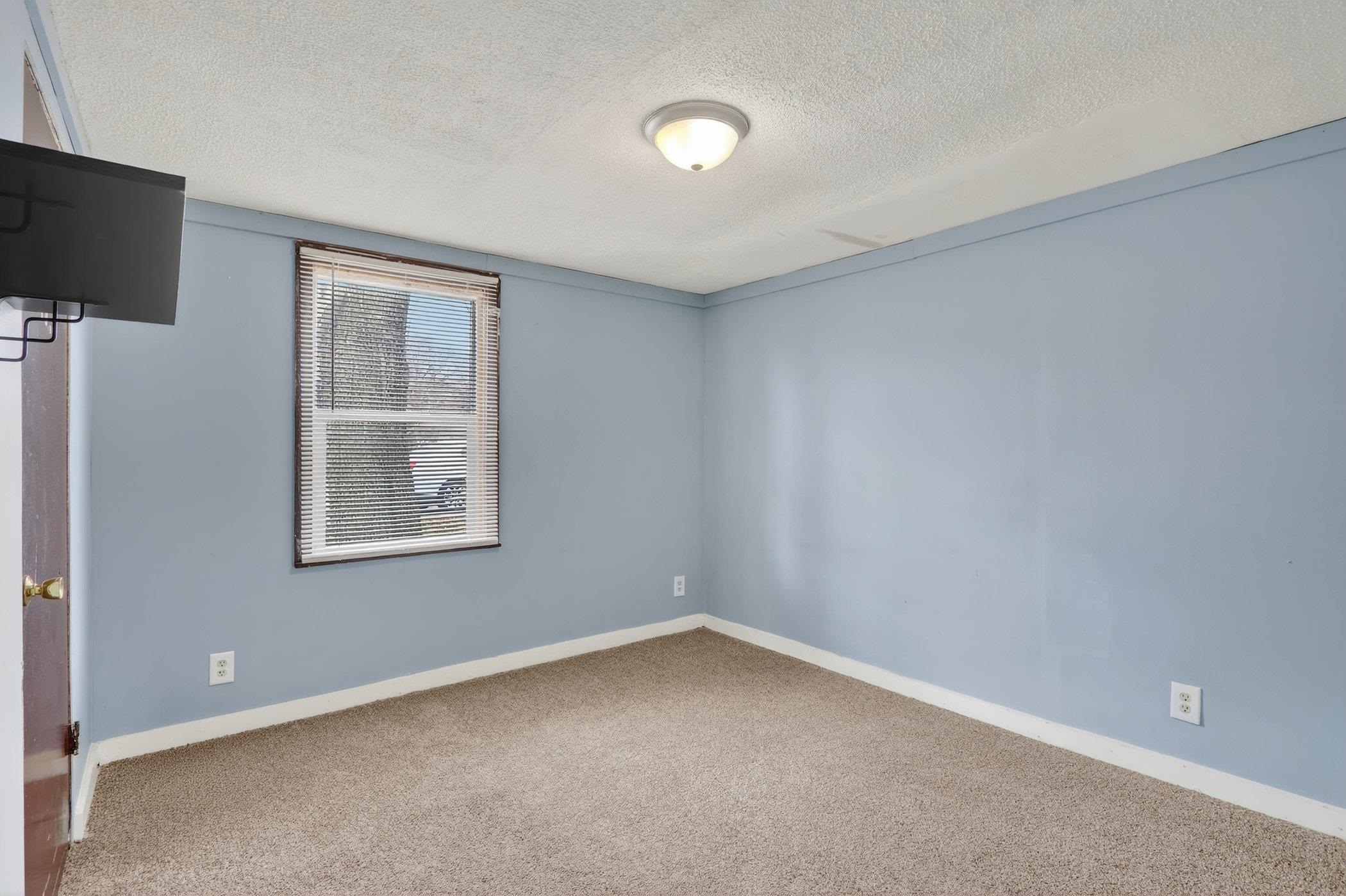 2120 Belden Street Rockford, IL 61101 - Photo 17 of 22 an empty room with windows